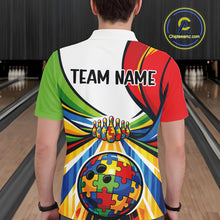 Load image into Gallery viewer, Male model at a bowling lane, back view of polo shirt featuring vibrant autism bowling lane artwork with multicolored puzzle-inspired details