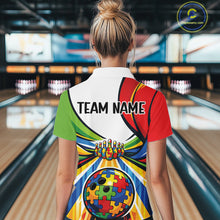 Load image into Gallery viewer, Back view of a female bowler wearing a quarter-zip shirt, autism-themed bowling lane artwork with multicolored puzzle elements.