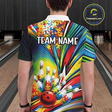 Load image into Gallery viewer, Male model at a bowling lane, back view of white polo shirt featuring colorful autism bowling strike artwork with puzzle accents