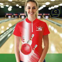 Load image into Gallery viewer, Female model front view at the bowling lane wearing a quarter zip shirt with bowling ball and pins flowing across a red gradient design.