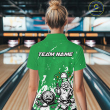 Load image into Gallery viewer, Back view of a female bowler wearing a green and white polo shirt, splatter-style drunk bowling pin illustration holding beer bottle and bowling ball.