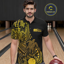 Load image into Gallery viewer, Male model wearing a black and gold bowling polo shirt at the bowling lane with turtle-inspired Polynesian bowling artwork.