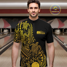 Load image into Gallery viewer, Male model wearing a black and gold bowling quarter-zip shirt at the lane with turtle Polynesian bowling graphics.