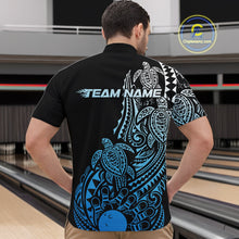 Load image into Gallery viewer, Front view of a male model in a black and blue bowling quarter-zip shirt displaying tribal bowling graphics and turtle patterns.