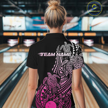 Load image into Gallery viewer, Back view of a female model in a black and pink bowling polo shirt displaying turtle-inspired bowling graphics and tribal swirls.