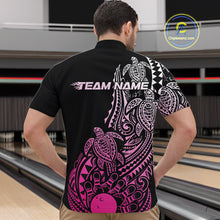 Load image into Gallery viewer, Front view of a male model in a black and pink bowling quarter-zip shirt featuring Polynesian-style bowling graphics.
