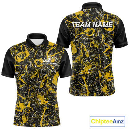 Front and back views of a black polo shirt with yellow paint-splatter graphics, personalized with â€œYour Nameâ€ on the chest and â€œTeam Nameâ€ across the back.
