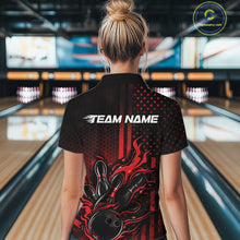 Load image into Gallery viewer, Back view of a female model in a bowling alley wearing a black and red quarter-zip shirt showcasing a flaming bowling ball hitting the pins.