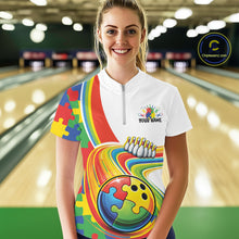 Load image into Gallery viewer, Female model in a bowling lane wearing a quarter-zip shirt, autism puzzle bowling lane artwork with bright multicolor design elements.
