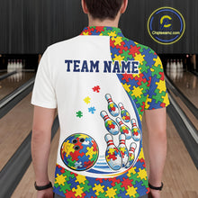 Load image into Gallery viewer, Male model in a bowling lane wearing a white polo shirt, back view featuring colorful autism-themed bowling strikes with puzzle-inspired graphics