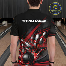 Load image into Gallery viewer, Male model in a bowling lane wearing a black polo shirt, back view featuring red flame bowling ball striking pins with abstract geometric stripe design