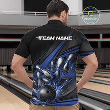 Load image into Gallery viewer, Male model in a bowling lane wearing a black quarter-zip shirt, blue flame bowling strike artwork with bold abstract motion graphics.