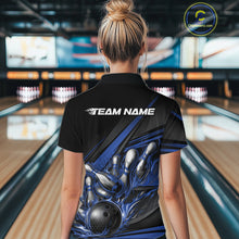 Load image into Gallery viewer, Back view of a female bowler wearing a black quarter-zip shirt, blue flame bowling strike design with geometric stripe accents.