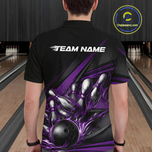 Load image into Gallery viewer, Male model at a bowling lane, back view of black polo shirt displaying purple flame bowling ball and pins with abstract stripe accents