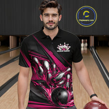 Load image into Gallery viewer, Male model in a bowling lane wearing black polo shirt, front view featuring hot pink flame bowling ball hitting pins with bold geometric design