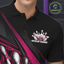 Load image into Gallery viewer, Close-up left chest detail of black bowling polo shirt featuring hot pink flame bowling ball and pins emblem with geometric accents