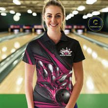 Load image into Gallery viewer, Female model at a bowling lane, front view wearing a black polo shirt with hot pink flame bowling ball knocking down pins and geometric stripes