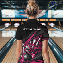 Load image into Gallery viewer, Back view of a female bowler wearing a black quarter-zip shirt, hot pink flame bowling strike design with abstract stripe details.