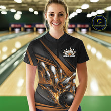 Load image into Gallery viewer, Female model in a bowling lane wearing a black quarter-zip shirt, gold flame bowling ball hitting pins with abstract sporty stripe design.