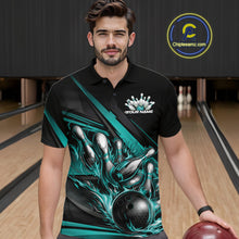 Load image into Gallery viewer, Male model in a bowling lane wearing black polo shirt, front view showcasing turquoise flame bowling ball hitting pins with geometric stripe design