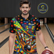 Load image into Gallery viewer, Male model in a bowling lane wearing a colorful polo shirt, front view featuring autism ribbon, butterfly, and flame bowling strike design