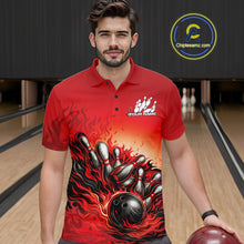 Load image into Gallery viewer, Male model in a bowling lane wearing a red polo shirt, front view showing flame bowling ball hitting pins dynamic bowling artwork