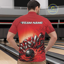 Load image into Gallery viewer, Male model in a bowling lane wearing a red quarter-zip shirt, fiery bowling strike artwork with bold motion bowling pin impact design.