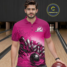 Load image into Gallery viewer, Male model in a bowling lane wearing a pink polo shirt, front view featuring flame bowling ball hitting pins artwork