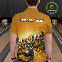 Load image into Gallery viewer, Male model at a bowling lane, back view wearing yellow polo shirt with flame bowling ball striking pins and dynamic bowling graphics