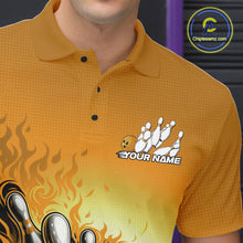 Load image into Gallery viewer, Close-up left chest detail of yellow bowling polo shirt featuring flame bowling ball and pins emblem design