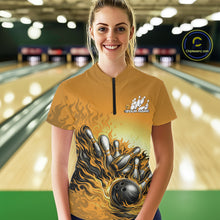 Load image into Gallery viewer, Female model in a bowling lane wearing a yellow quarter-zip shirt, flame bowling ball and pins artwork with energetic strike-themed graphics.