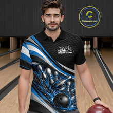 Load image into Gallery viewer, In a bowling lane, male model wearing a black and blue polo shirt, flame bowling ball striking pins with glowing fire-inspired sports graphics.