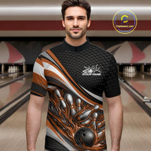 Load image into Gallery viewer, Male model at a bowling lane wearing a black and orange quarter-zip shirt, fiery bowling ball hitting pins with high-energy sports graphics.