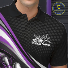 Load image into Gallery viewer, Close-up view of left chest area of a black and purple polo shirt, showing small flame bowling ball and pins graphic detail.