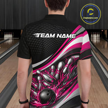 Load image into Gallery viewer, Back view of a male bowler wearing a black and pink polo shirt, flame bowling strike design with scattered pin effect.