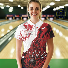 Load image into Gallery viewer, Front view of a female model in a bowling lane wearing a black quarter-zip shirt with red and white flame bowling ball and pins artwork and dynamic bowling visuals.