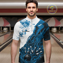 Load image into Gallery viewer, Front view of a male model in a bowling lane wearing a black quarter-zip shirt with blue and white flame bowling ball and pins graphics and energetic bowling visuals.