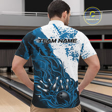 Load image into Gallery viewer, Front view of a male model in a bowling lane wearing a black quarter-zip shirt featuring blue and white flame bowling ball and pins artwork with dynamic sports design.