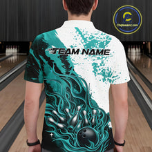 Load image into Gallery viewer, Bowling lane back view male model wearing bowling polo shirt, black base with turquoise blue and white flame bowling ball and pins artwork, promotional sports atmosphere