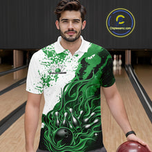 Load image into Gallery viewer, In bowling lane front view male model wearing bowling polo shirt, black base with green and white flame bowling ball and pins artwork, dynamic sports lighting