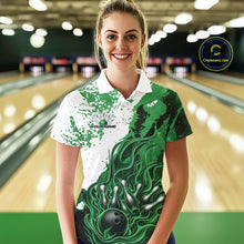 Load image into Gallery viewer, In bowling lane front view female model wearing bowling polo shirt, black green and white color scheme, flame bowling ball and pins artwork, dynamic sports environment