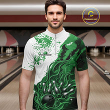 Load image into Gallery viewer, Front view of a male model in a bowling lane wearing a black quarter-zip shirt with black, green and white flame bowling ball and pins graphics.