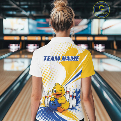 A woman viewed from behind wearing a customized bowling-themed short-sleeve quarter zip shirt. The shirt features a white, yellow, and blue graphic design with a cartoon yellow duck holding a bowling ball and pins, and the text 'TEAM NAME' printed in blue.