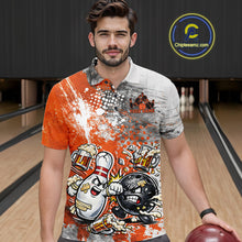 Load image into Gallery viewer, Front view of a male model in a bowling lane wearing an orange and white grunge splatter polo shirt with funny bowling ball and pin battle illustration.