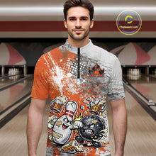 Load image into Gallery viewer, Front view of a male model in a bowling lane wearing an orange and white grunge splatter bowling quarter-zip shirt with funny cartoon bowling battle artwork.