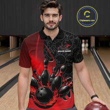 Load image into Gallery viewer, Front view of a male model in a bowling lane wearing a black and red polo shirt with flaming black bowling ball striking pins and dynamic sports graphics.