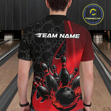 Load image into Gallery viewer, Back view of a male model in a bowling lane wearing a black and red polo shirt featuring flaming black bowling ball striking pins with athletic bowling visuals.