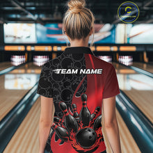 Load image into Gallery viewer, Inside a bowling lane, back view of a female model wearing a black and red bowling quarter-zip shirt, featuring flaming bowling ball hitting pins artwork with gradient pattern design.