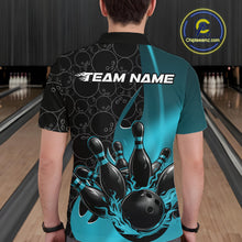Load image into Gallery viewer, Back view of a male model in a bowling lane wearing a black and blue polo shirt featuring flaming black bowling ball striking pins with bold sports styling.