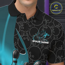 Load image into Gallery viewer, Close-up view of the left chest of a black and blue bowling polo shirt showing gradient bowling ball pattern with flaming bowling strike detail.
